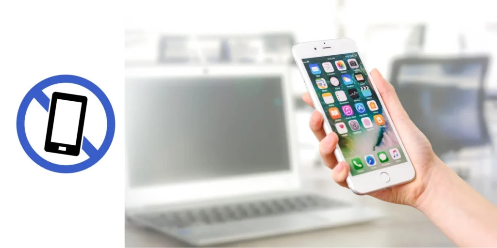 Hand holding an iPhone with a restriction symbol overlay, illustrating parental filter iPhone settings to block apps, limit content, and protect children online